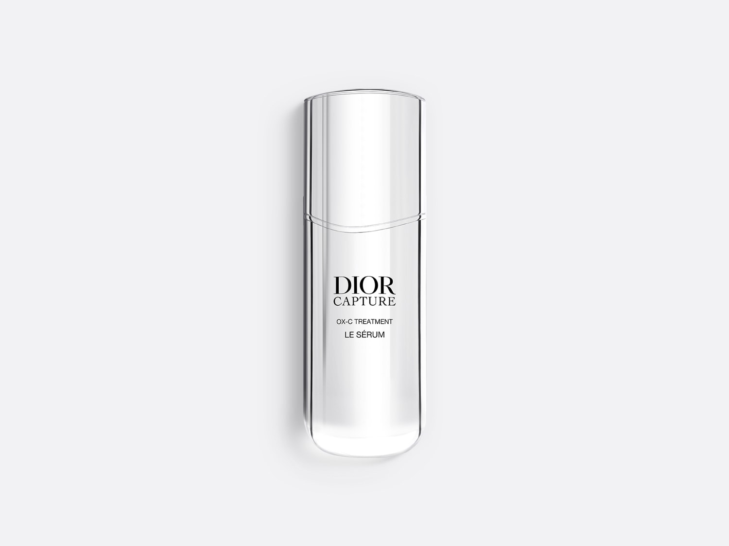 Przezroczysta butelka serum Dior Capture OX-C Treatment Le Sérum, idealna do pielęgnacji skóry i redukcji zmarszczek.