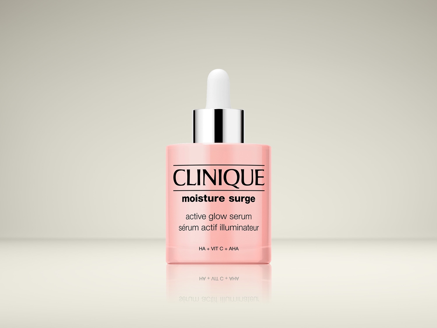 Roze Clinique Moisture Surge Active Glow Serum fles met een zilveren dop en een witte applicator.