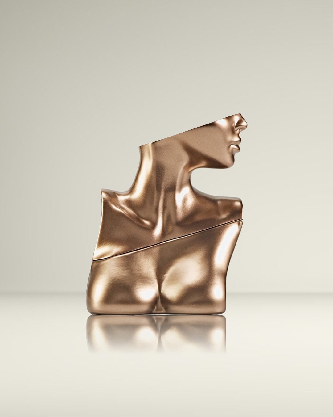 Bronzen parfumflesje in de vorm van een buste, een uniek en elegant ontwerp.