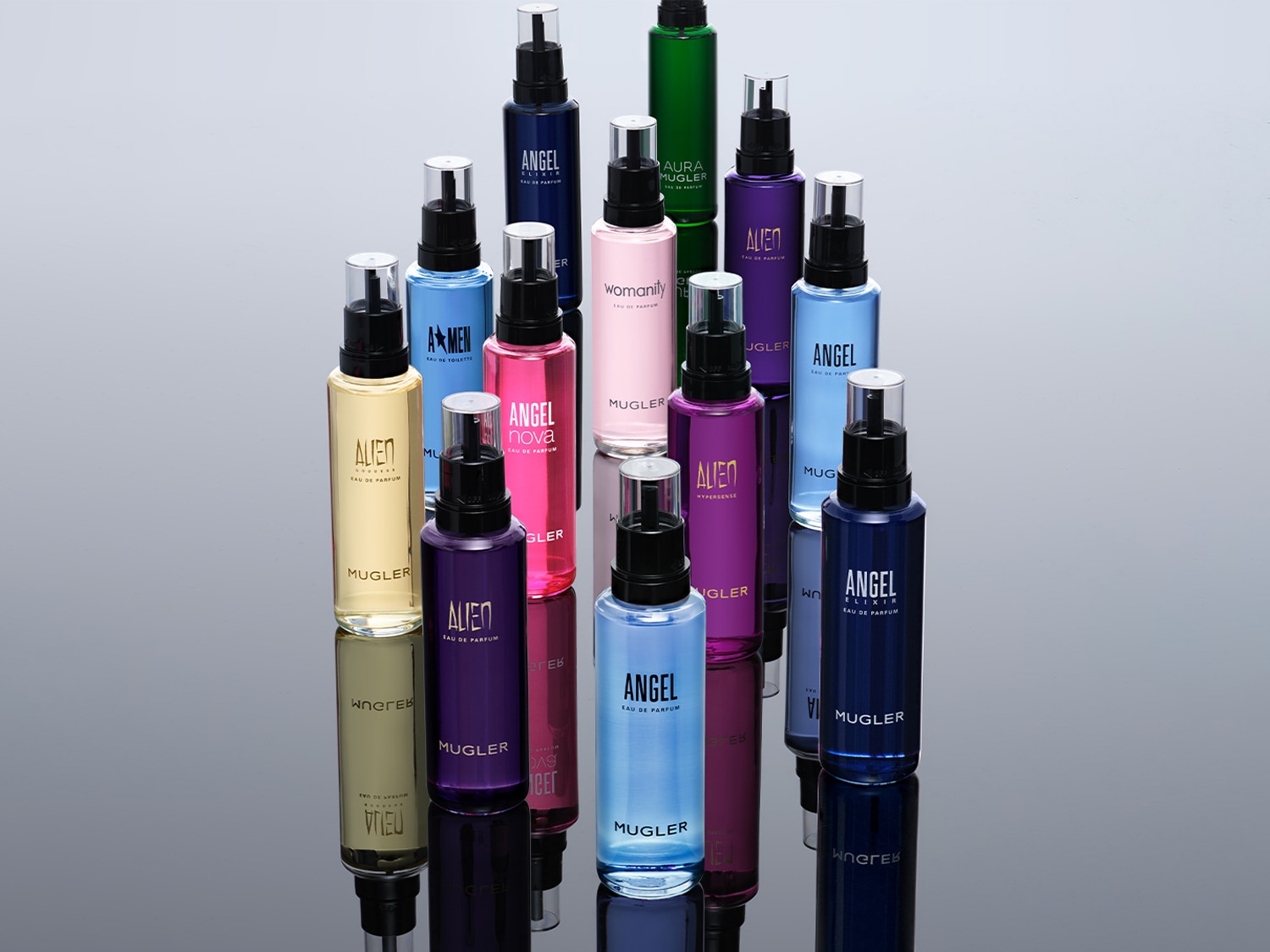 Découvrez une gamme de parfums Mugler, incluant Alien et Angel, dans des flacons colorés allant du vert au violet, reflétant l'élégance et le luxe.