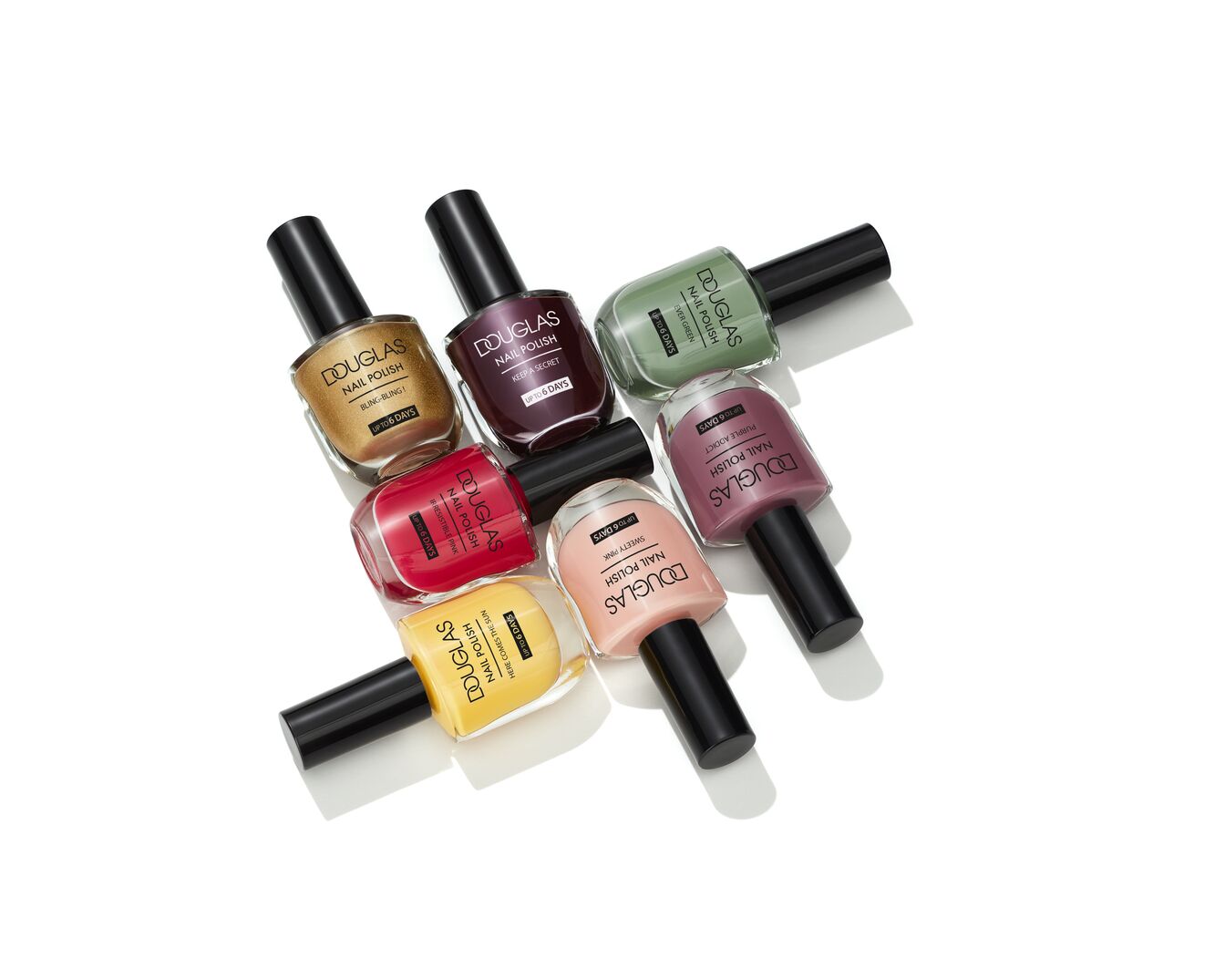 Entdecke die Douglas Nagellack Kollektion: Goldener 'Bling-Bling!', dunkles 'Keep a Secret', frisches 'Ever Green', zartes 'Sweety Pink', leuchtendes 'Here Comes the Sun' und intensives 'Irresistible Pink' für bis zu 6 Tage Halt.