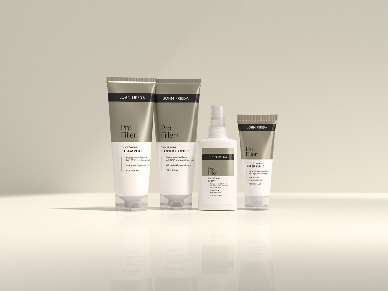Sada vlasovej kozmetiky John Frieda Pro Filler+ pre jemné vlasy: šampón, kondicionér, sprej a posilňujúca tekutina.