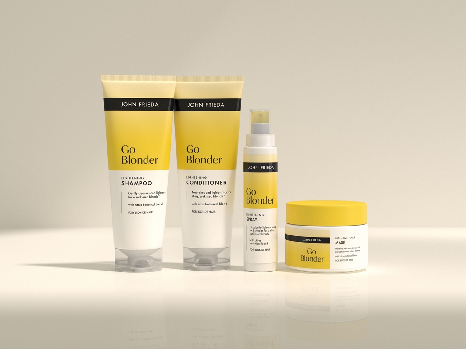 Súprava John Frieda Go Blonder obsahuje šampón, kondicionér, sprej a masku pre zosvetlenie a oživenie blond vlasov.