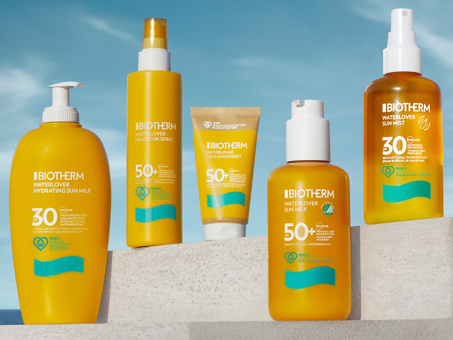 Descubre la gama Waterlover de Biotherm: protectores solares en envases amarillos y blancos, desde leche hidratante hasta bruma, con SPF 30 y 50+ para una alta protección y resistencia al agua.