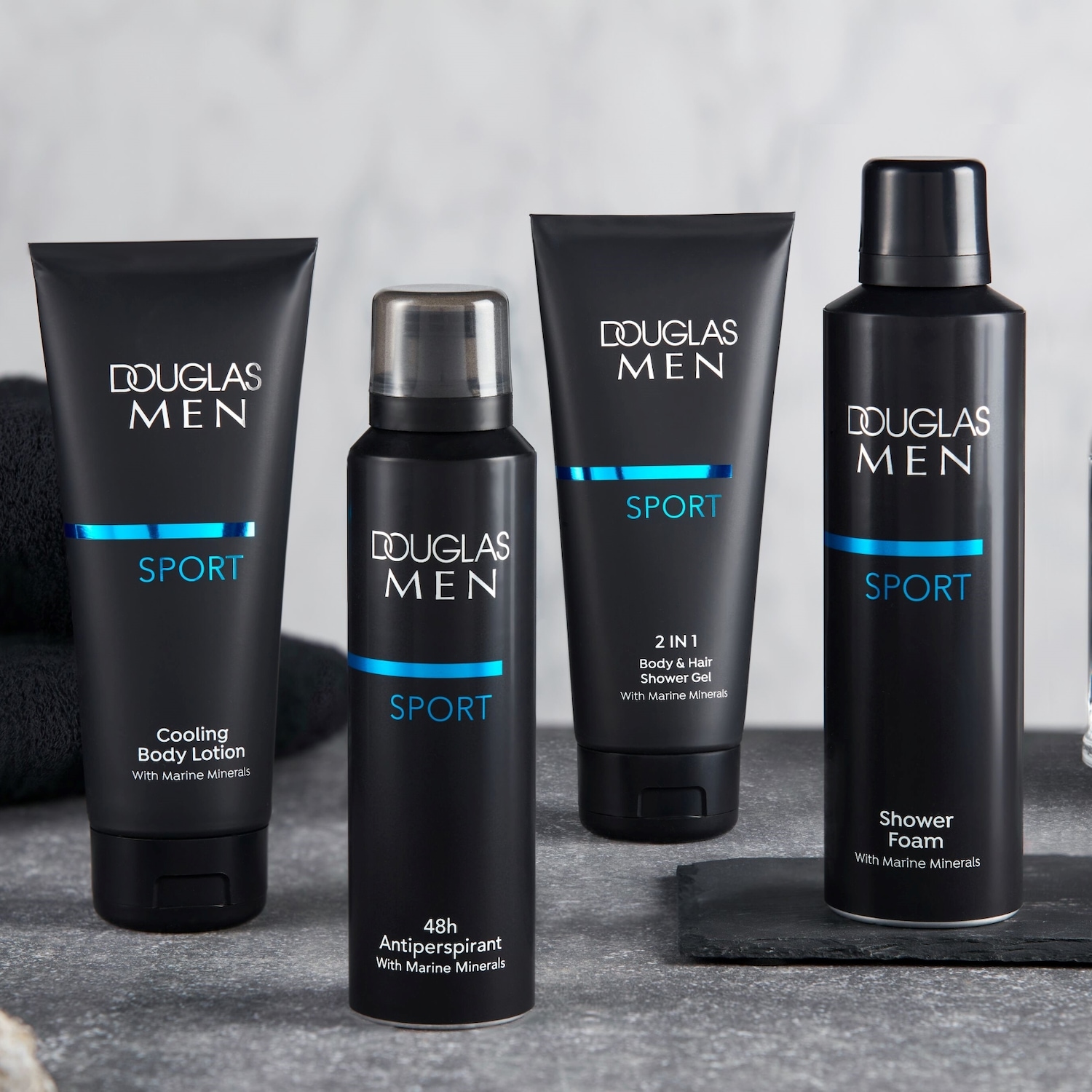 Douglas Men Sport-Serie mit Kühlendem Body Lotion, 48h Antiperspirant, 2-in-1 Duschgel und Duschschaum mit Meeresmineralien.