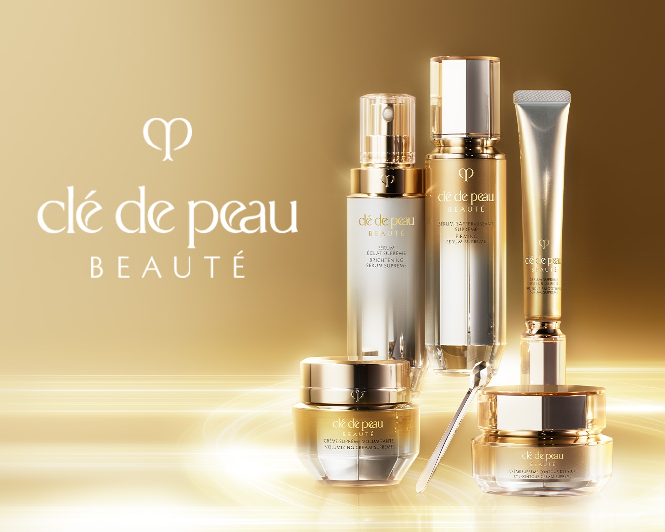 Entdecken Sie die luxuriöse Hautpflegeserie von Clé de Peau Beauté, bestehend aus Seren und Cremes in eleganten Gold- und Silbertönen für eine umfassende Schönheitsroutine.