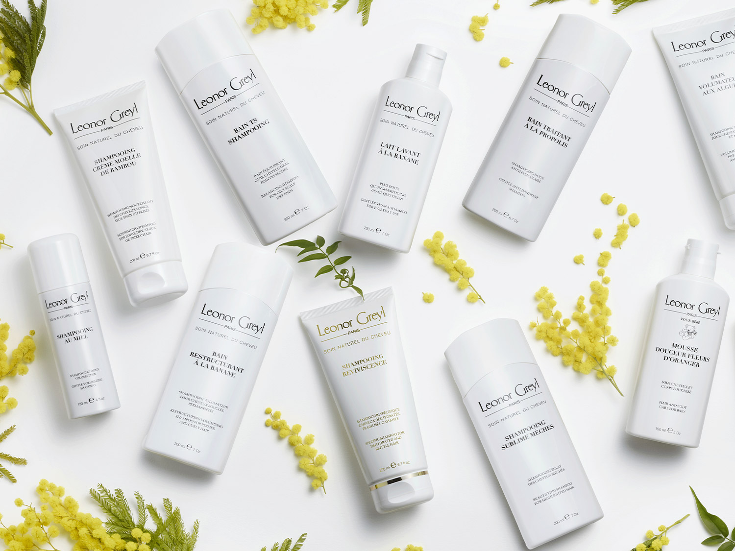 Odkryj kolekcję szamponów Leonor Greyl Paris Soin Naturel du Cheveu, w białych opakowaniach, każdy stworzony, by pielęgnować Twoje włosy.