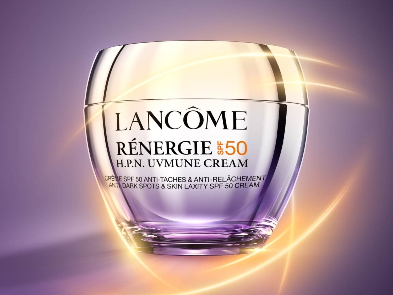 Priehľadný sklenený téglik Lancôme Rénergie H.P.N. UVMUNE Cream SPF 50 s čiernym písmom na fialovom pozadí so zlatými líniami.