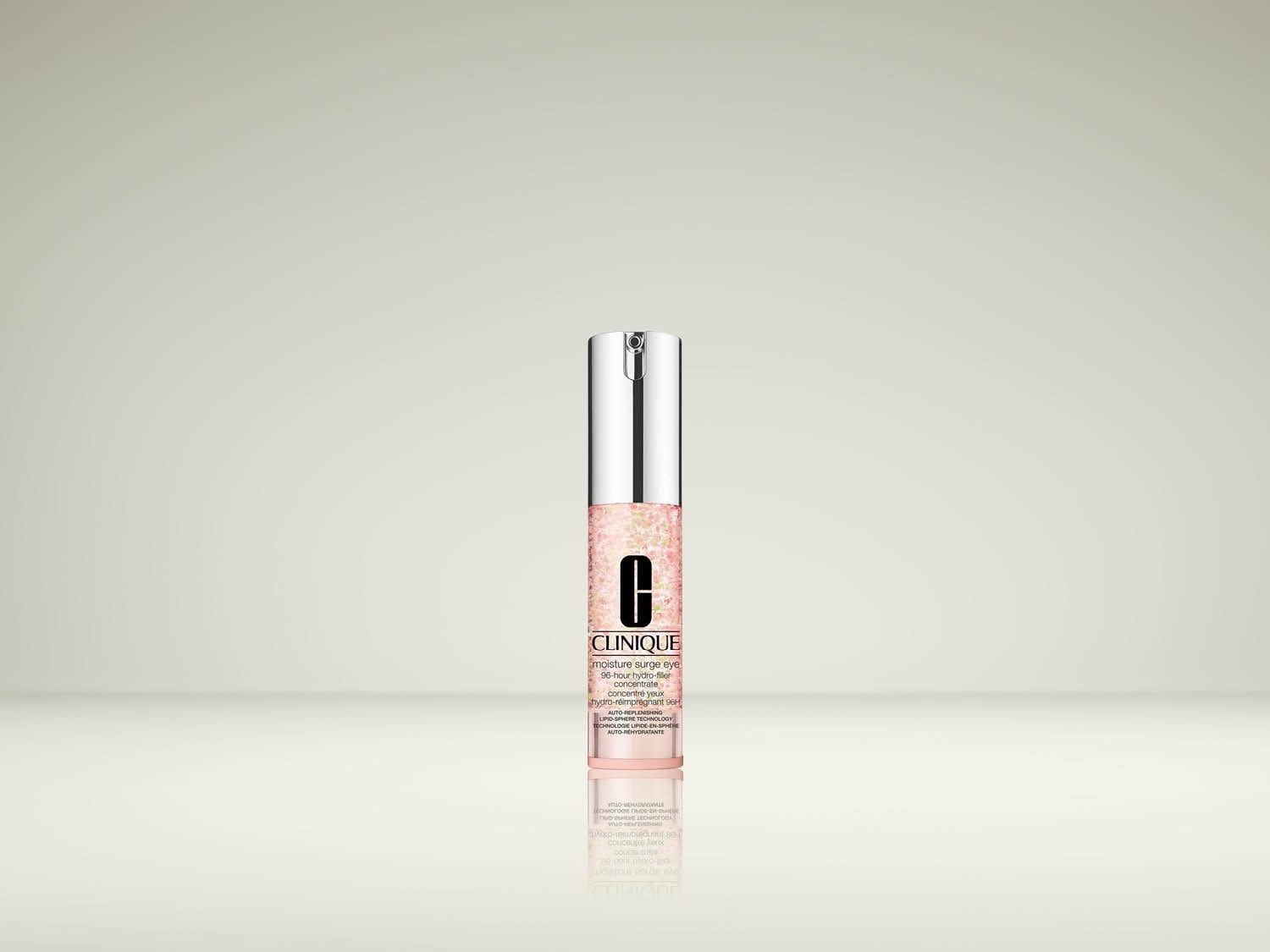 De Clinique Moisture Surge Eye 96-Hour Hydro-Filler Concentrate is een oogcrème in een transparante fles met roze en witte spikkels, een zilveren dop en de merknaam in zwarte letters.