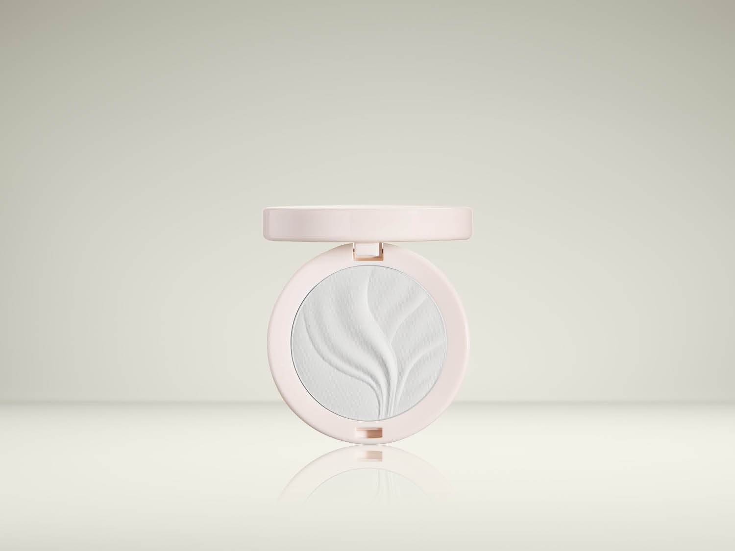 Découvrez la poudre compacte translucide dans un boîtier rose pâle, ornée d'un motif floral délicat, parfaite pour un teint matifié et unifié.