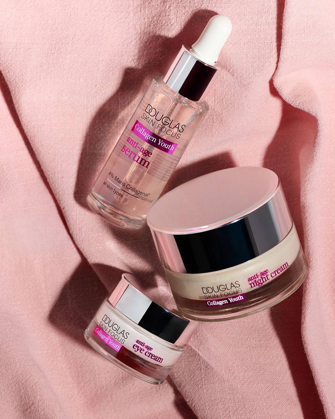 Douglas Skin Focus Collagen Youth set includes anti-age serum in a clear bottle with a dropper, night cream, and eye cream in jars, all designed to reduce the signs of aging.