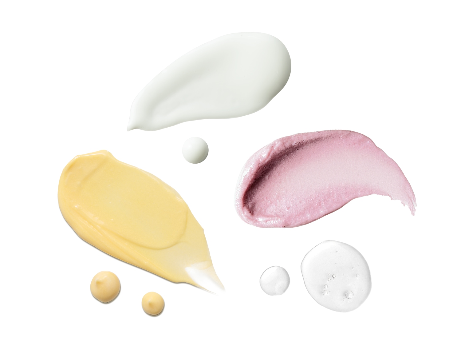 Na białym tle widoczne są próbki kosmetyków o różnych konsystencjach i kolorach: biały krem, żółty balsam, różowa maska i przezroczysty żel.