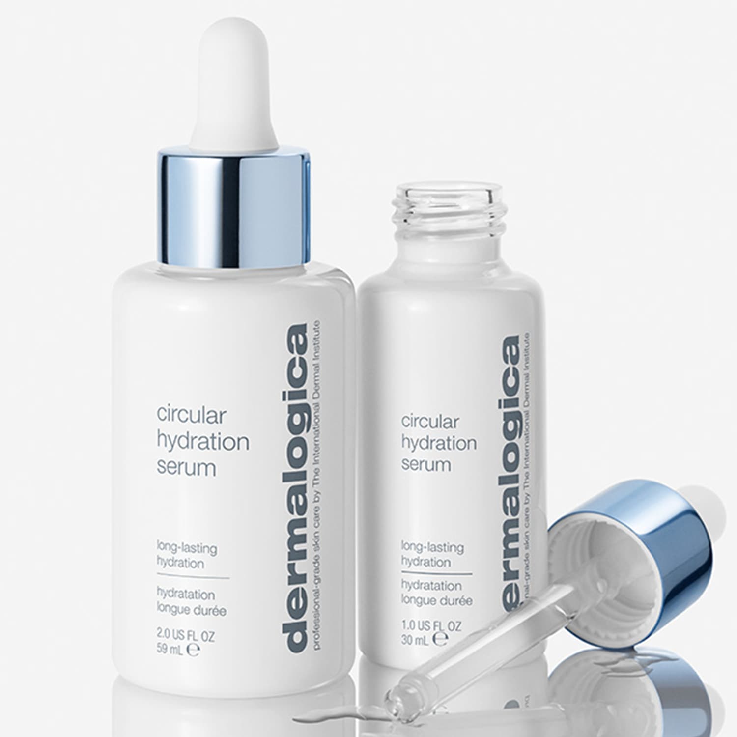 Zwei weiße Flaschen Dermalogica Circular Hydration Serum mit Pipettenapplikator, die langanhaltende Feuchtigkeit spenden.