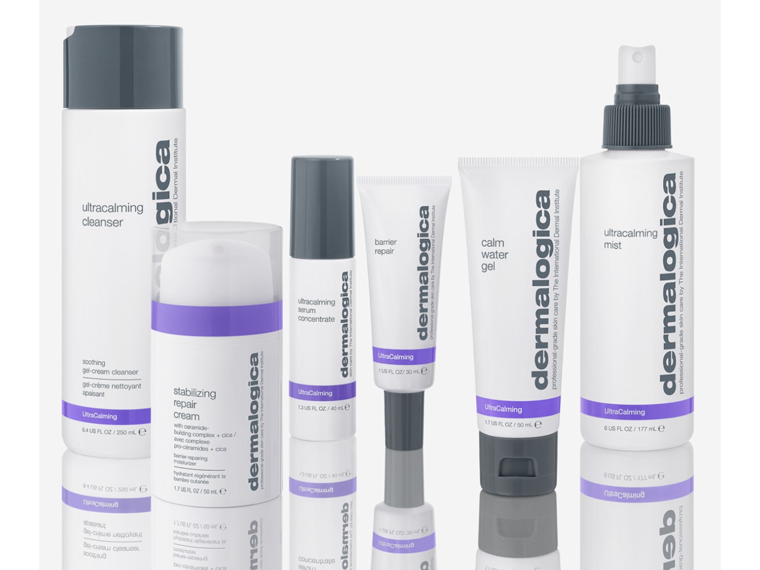 Eine Reihe von Dermalogica-Hautpflegeprodukten, darunter Reinigungsmittel, Seren, Cremes und Nebel, die alle in weißen Flaschen mit violetten Akzenten verpackt sind.