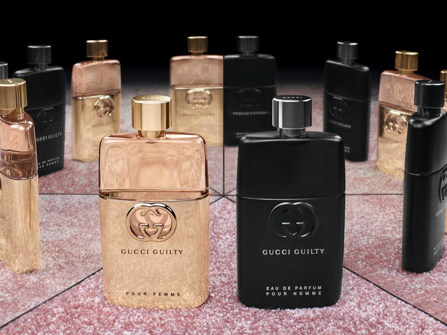 Eleganckie flakony perfum Gucci Guilty dla kobiet i mężczyzn, w odcieniach złota i czerni, z wyraźnym logo marki, idealne na prezent.