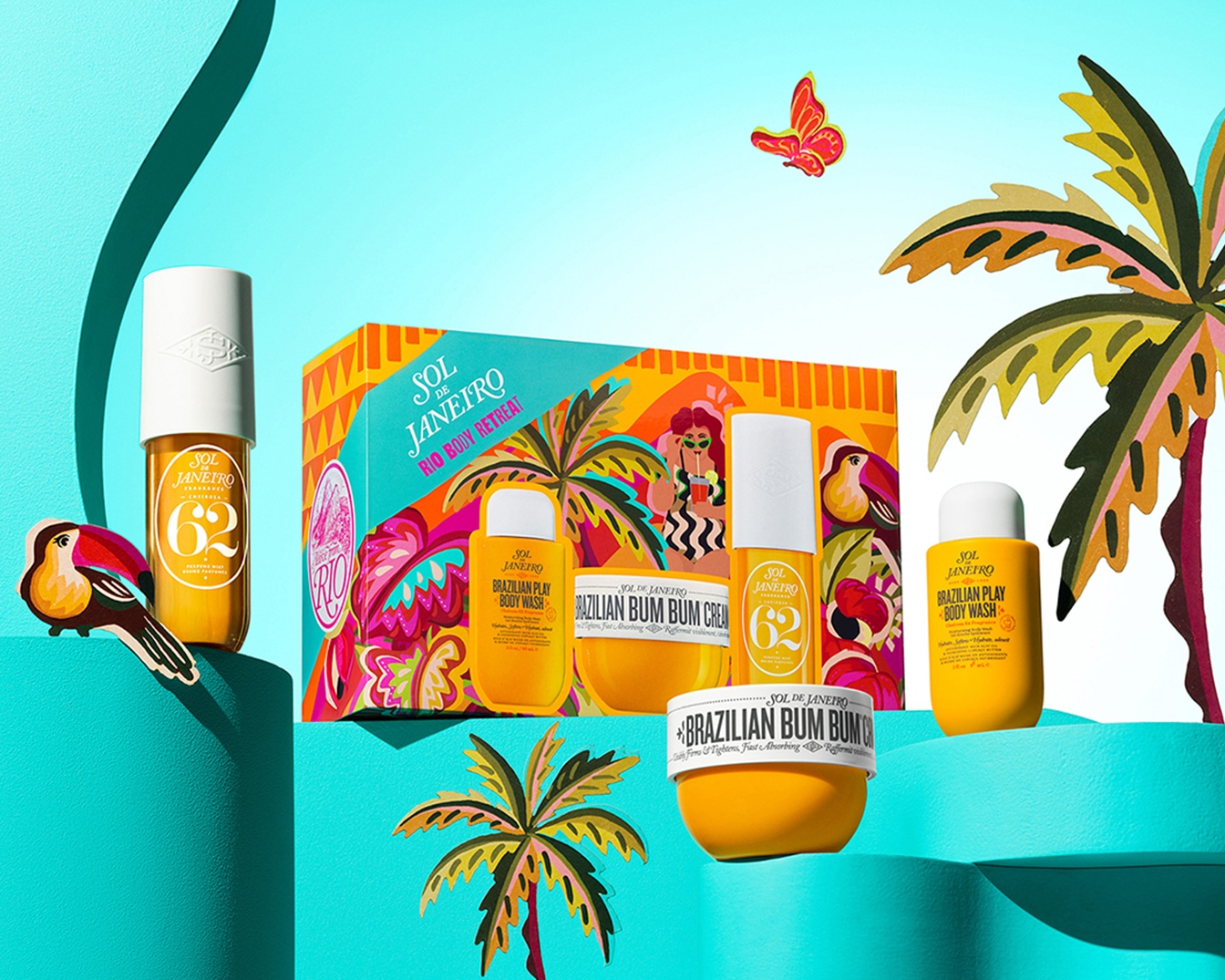 Ontdek de Sol de Janeiro Rio Body Retreat set, met de iconische Brazilian Bum Bum Cream, Brazilian Play Body Wash en Cheirosa '62 parfum mist, gepresenteerd in kleurrijke verpakkingen.