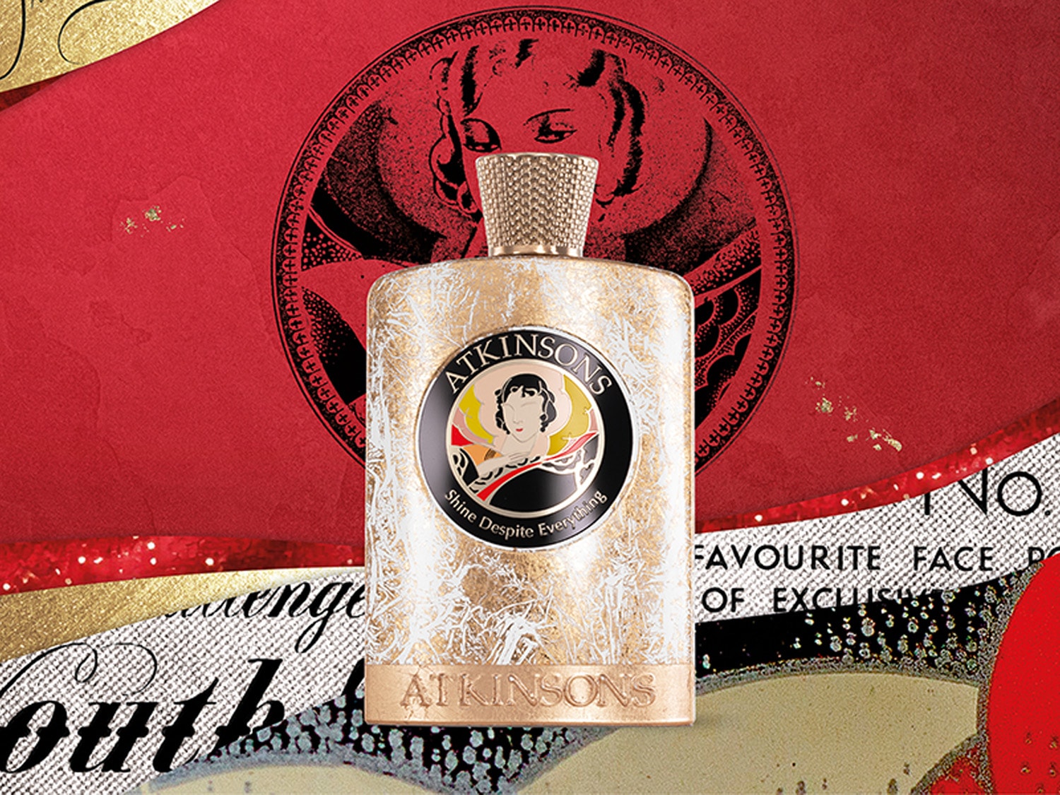 Butelka perfum Atkinsons z etykietą Shine Despite Everything na tle czerwieni i złota.