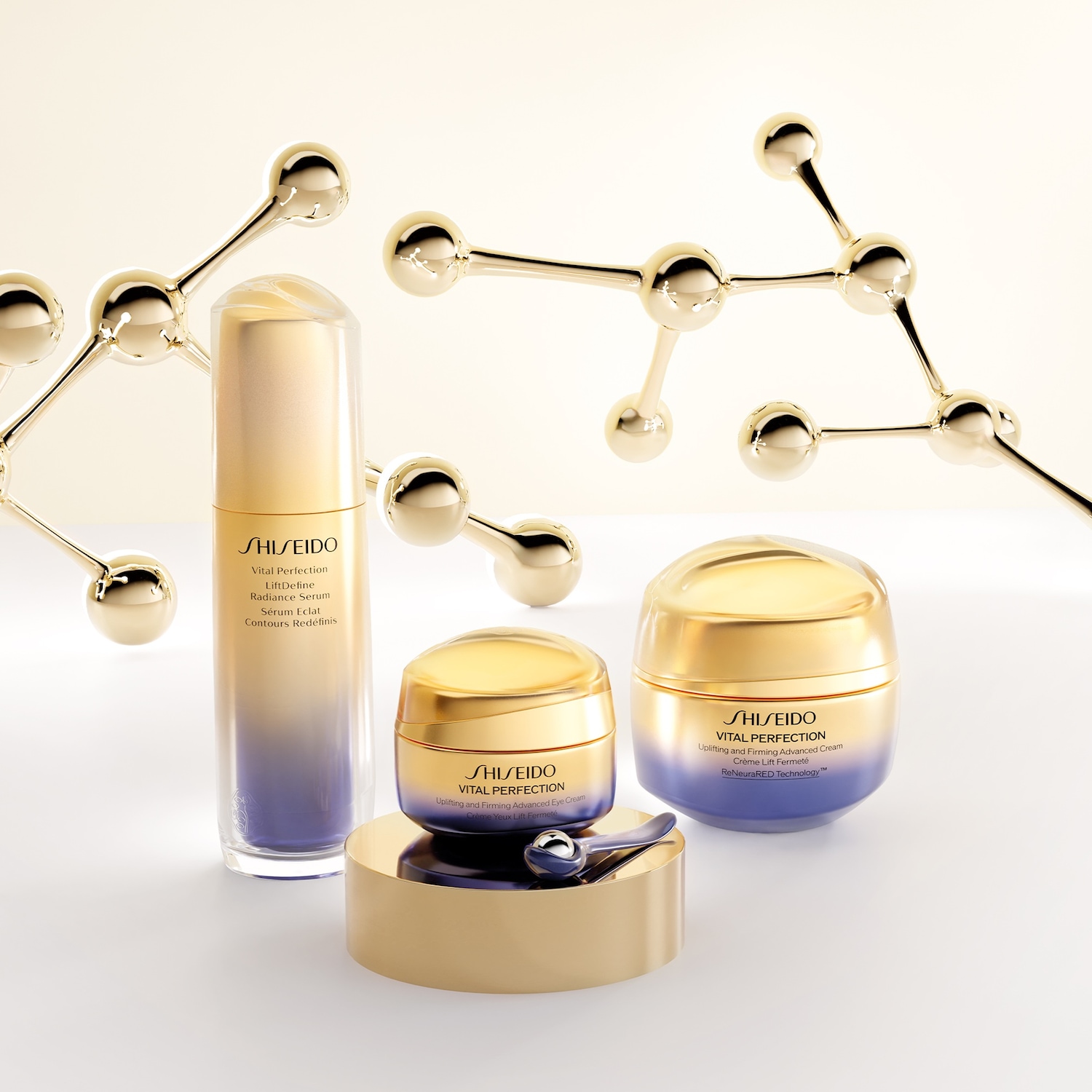 Entdecken Sie Shiseido Vital Perfection: LiftDefine Radiance Serum für strahlende Konturen, präsentiert in einer eleganten golden-violetten Verpackung.