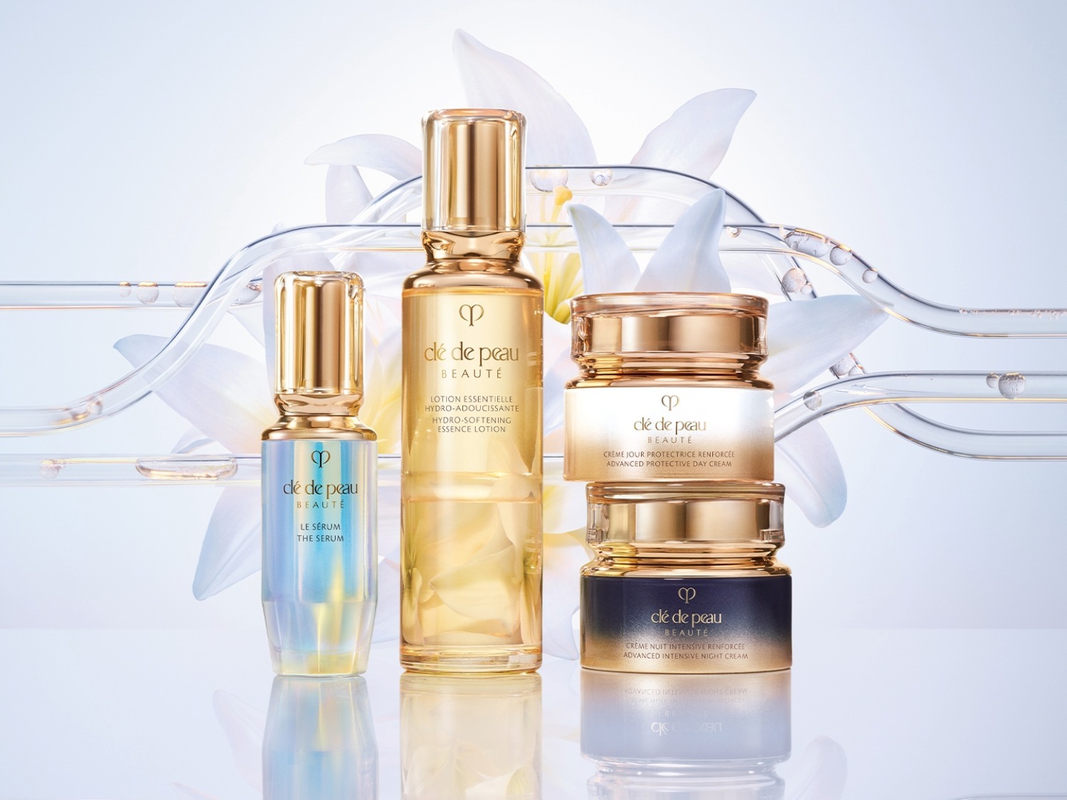 Découvrez la collection de soins de la peau Clé de Peau Beauté, comprenant le sérum, la lotion essentielle, la crème de jour protectrice et la crème de nuit intensive.