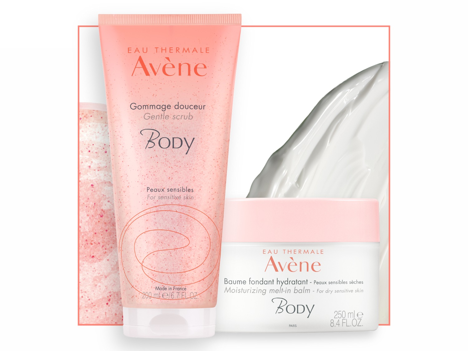 Avène Body Gentle Scrub in een roze tube en hydraterende smeltbalsem in een witte pot met roze deksel, beide voor de gevoelige huid.