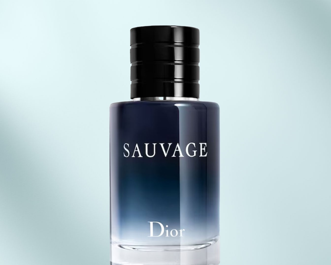 Sauvage tualetinis vanduo stikliniame buteliuke su juodu dangteliu, ant kurio užrašytas Dior prekės ženklas.