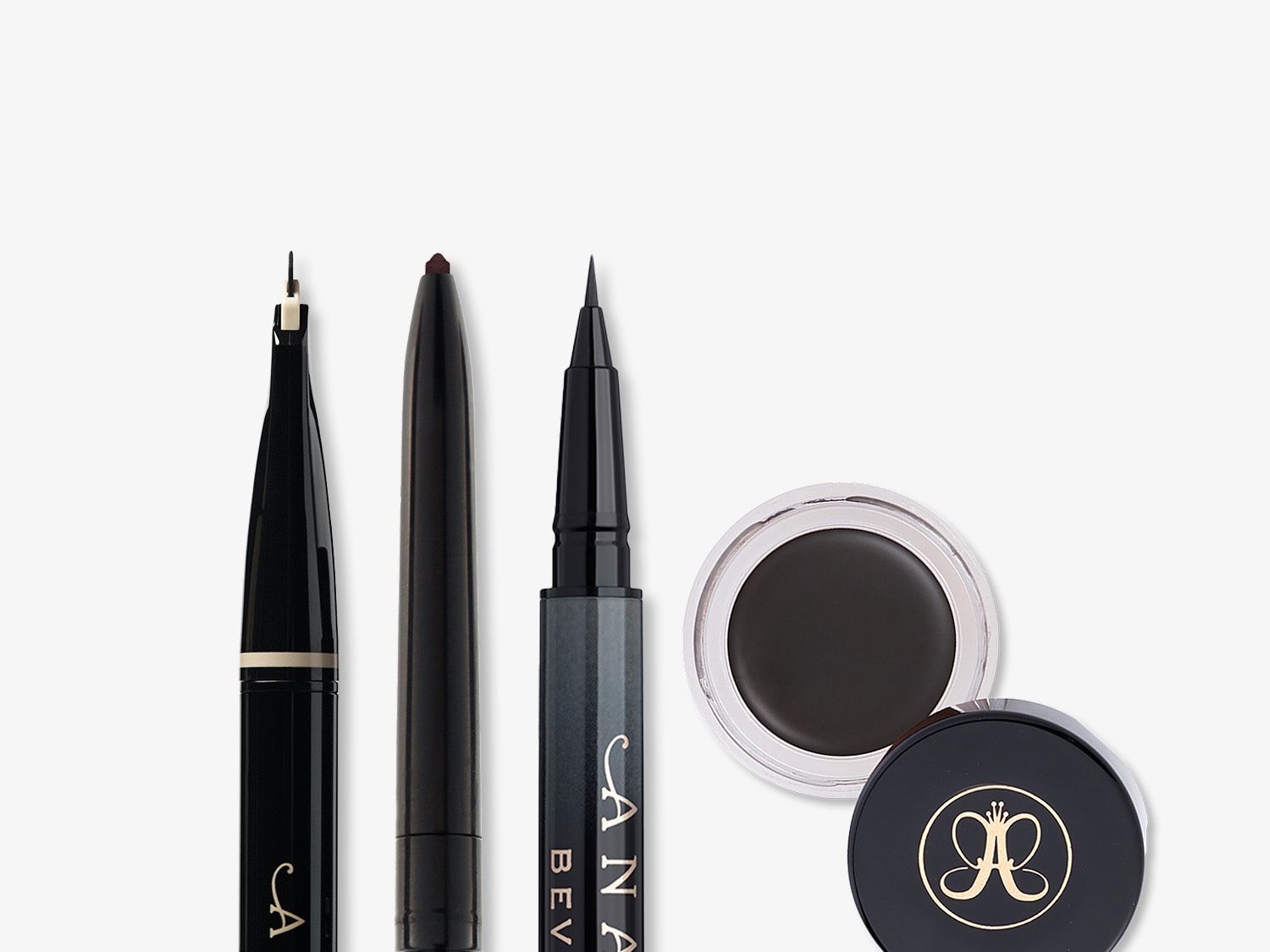 Ontdek de Anastasia Beverly Hills collectie: zwarte eyeliner in potje met deksel, een bruine wenkbrauwpotlood en een zwarte eyelinerstift voor een perfect gedefinieerde look.