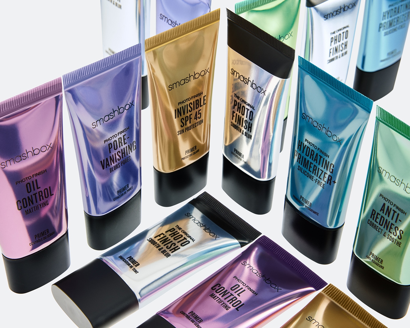 Scopri la gamma di primer Smashbox Photo Finish: dal controllo dell'oleosità alla protezione solare SPF 45, ogni primer è confezionato in tubi colorati con finitura nera.