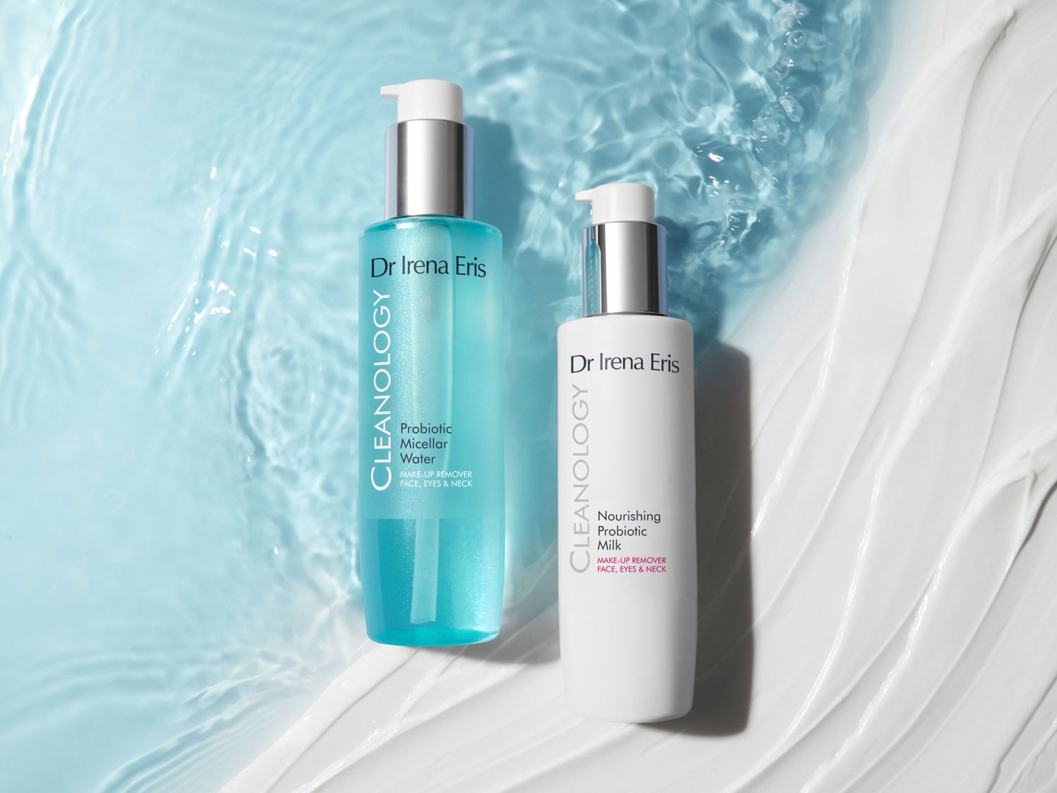 Dwa produkty do demakijażu Dr Irena Eris Cleanology: płyn micelarny w turkusowej butelce i odżywcze mleczko w białej butelce, oba z pompkami, na tle wody i kremu.