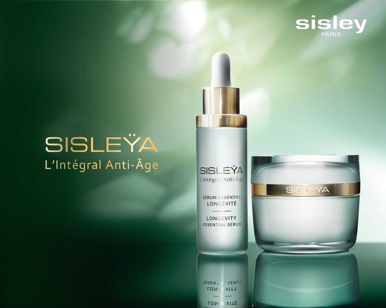 Ontdek Sisley Paris Sisleÿa L'Intégral Anti-Âge, een krachtig serum in een zilveren flesje met gouden details, naast een potje crème, beide gericht op een jeugdige uitstraling.