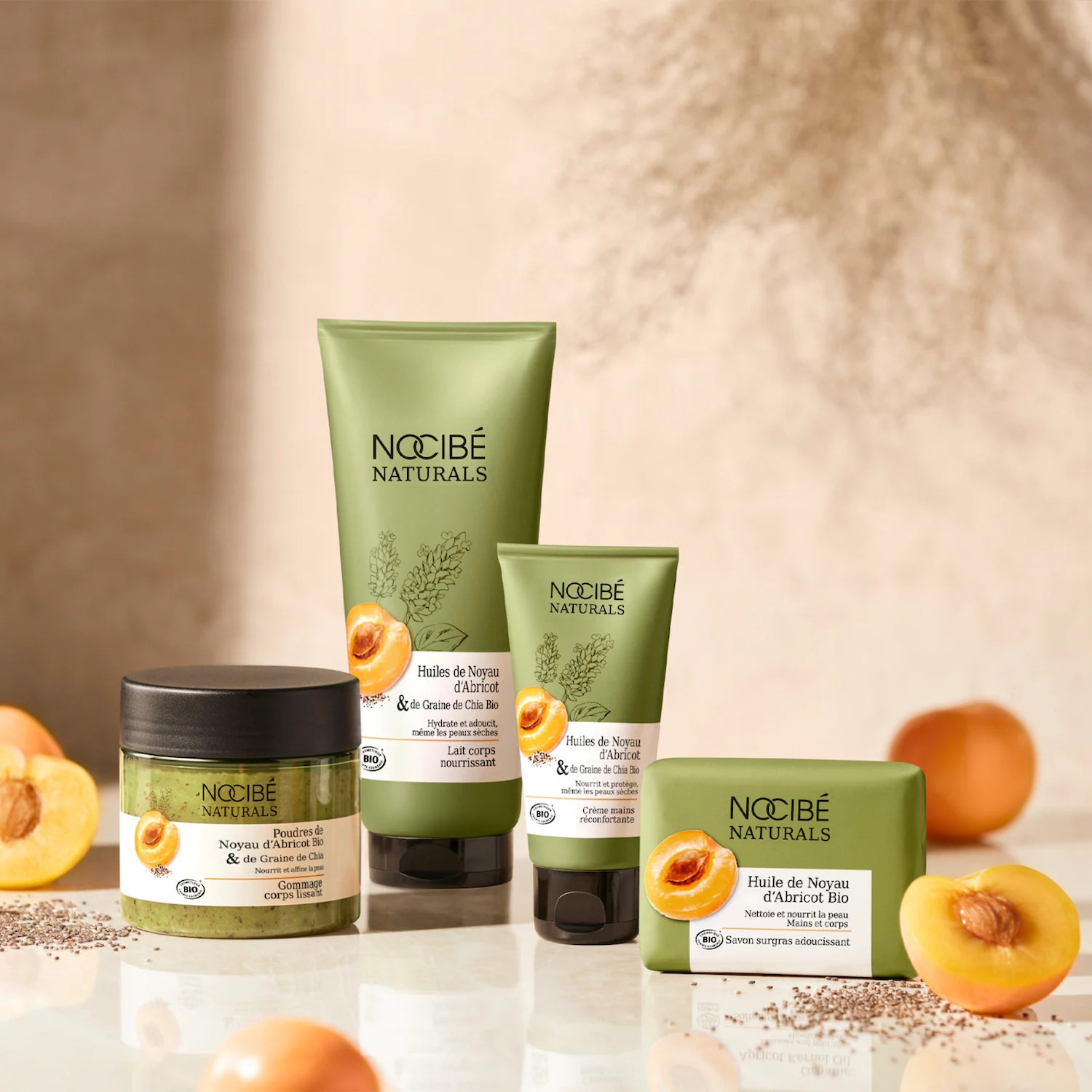 Découvrez la gamme Nocibé Naturals à l'huile de noyau d'abricot Bio, comprenant un gommage corps lissant, un lait corps nourrissant, une crème mains réconfortante et un savon surgras adoucissant.