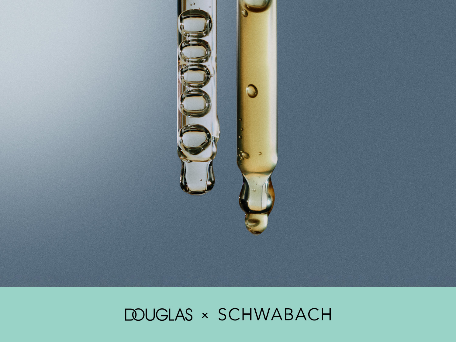 Nahaufnahme von zwei Pipetten, eine mit klarer Flüssigkeit und die andere mit goldener Flüssigkeit, die die Zusammenarbeit zwischen Douglas und Schwabach hervorhebt.