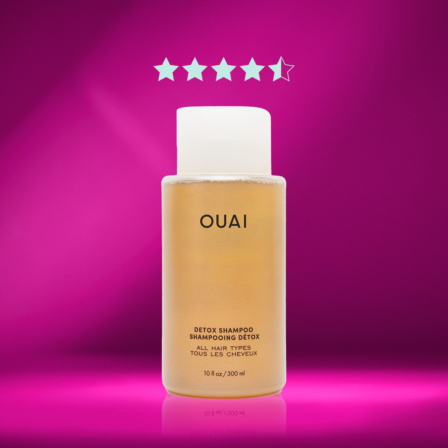 Voici le shampooing détox OUAI pour tous les types de cheveux, présenté dans un flacon transparent de 300 ml avec un bouchon blanc, promettant un nettoyage en profondeur.