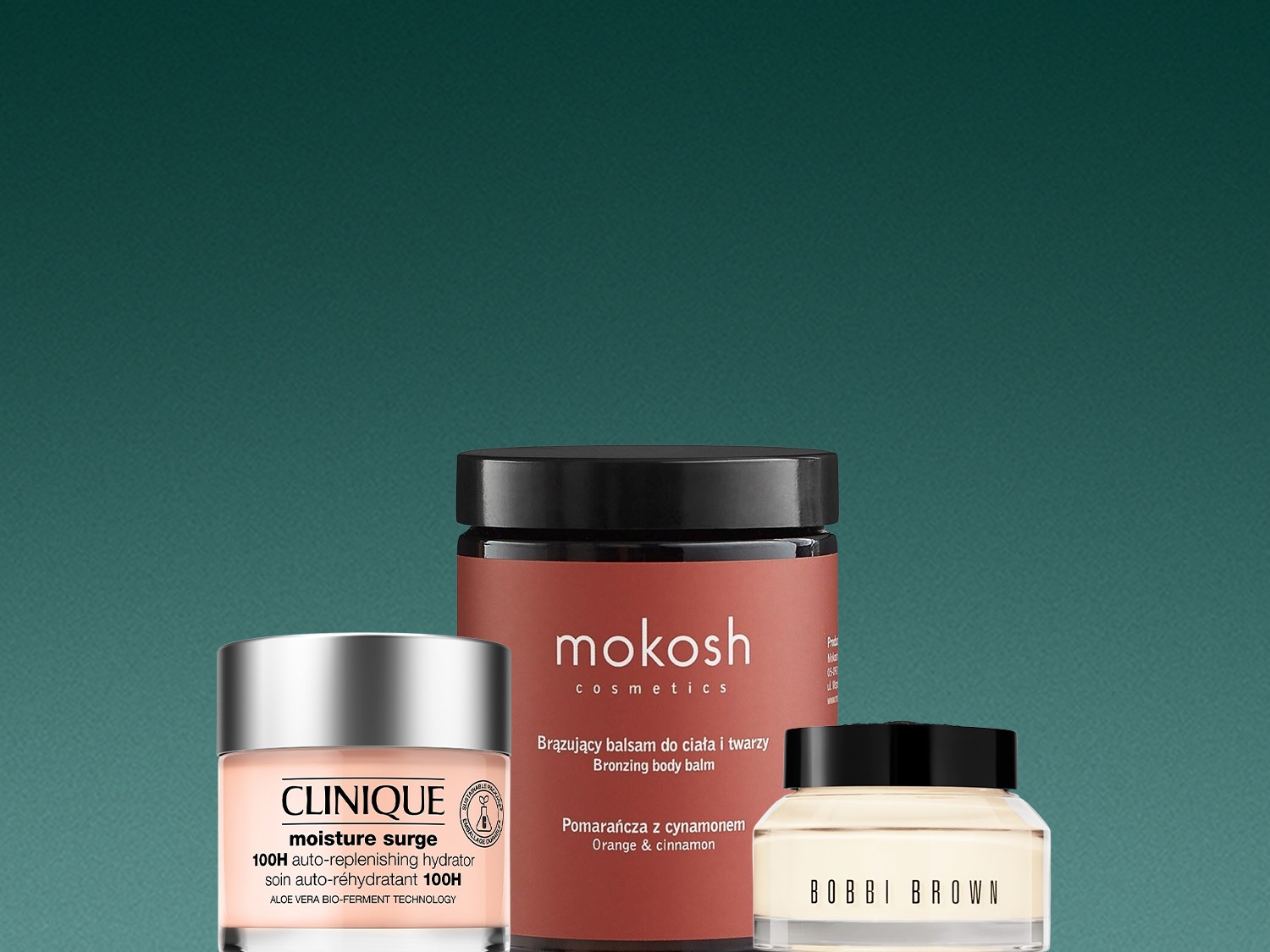 Trzy różne kremy nawilżające do twarzy i ciała: Clinique Moisture Surge, Mokosh Bronzing Body Balm o zapachu pomarańczy i cynamonu oraz Bobbi Brown.