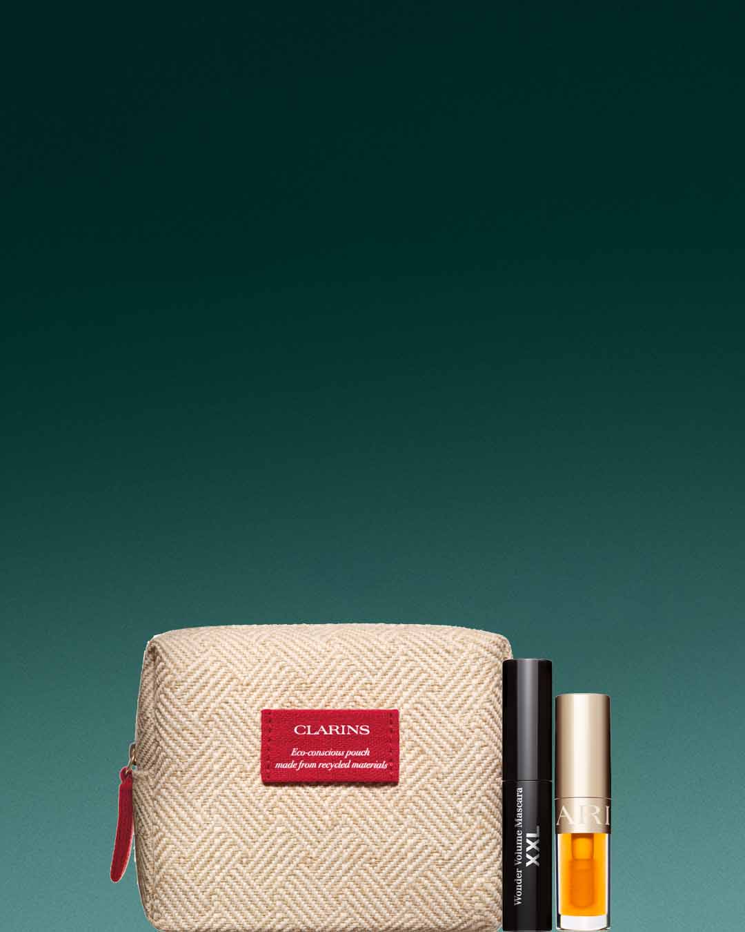 Zestaw kosmetyków Clarins: ekologiczna kosmetyczka z materiałów recyklingowych, tusz do rzęs Wonder Volume Mascara XXL i olejek do ust.