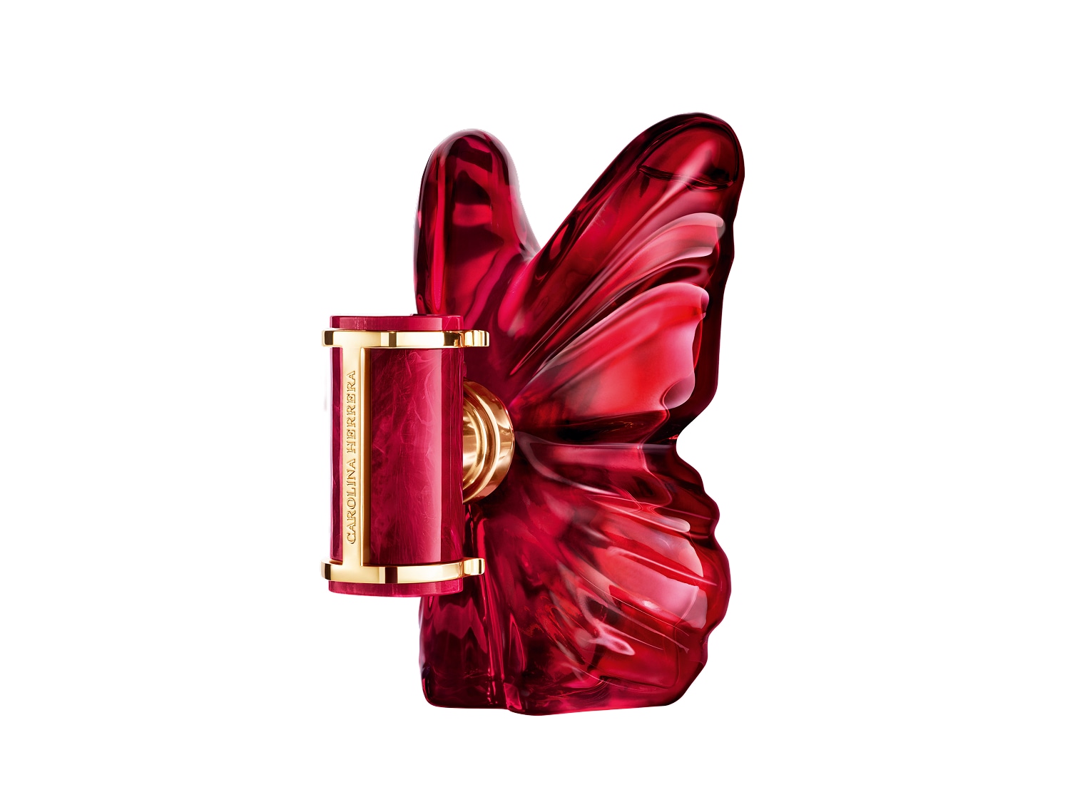 Flakon perfum Carolina Herrera w kształcie czerwonego motyla z marmurkowym wzorem, ze złotym elementem z napisem „CAROLINA HERRERA”.
