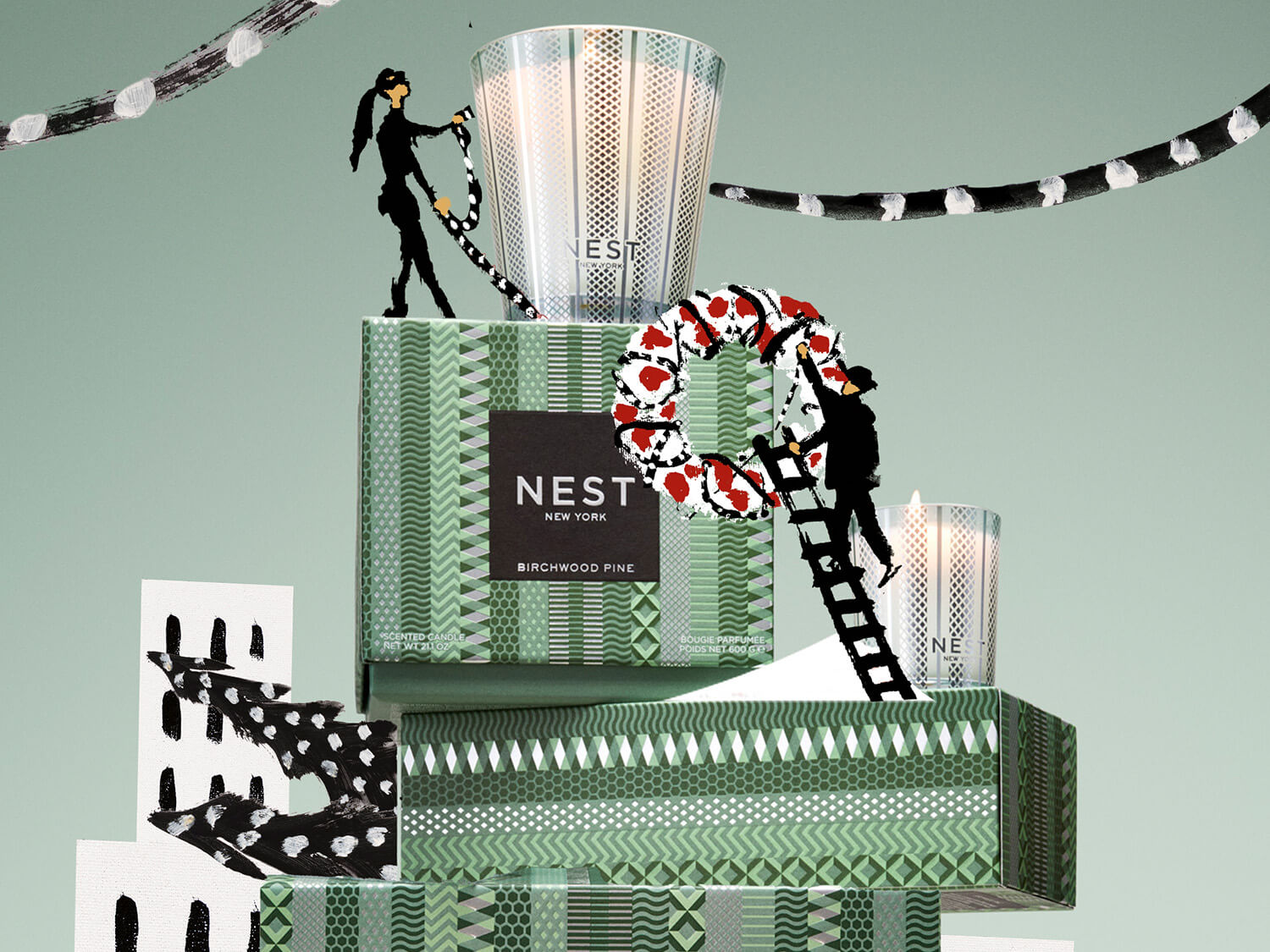 Ilustracja przedstawia świecę zapachową Nest New York Birchwood Pine, gdzie sylwetki ludzi wspinają się po pudełkach i świecach, tworząc świąteczną atmosferę.