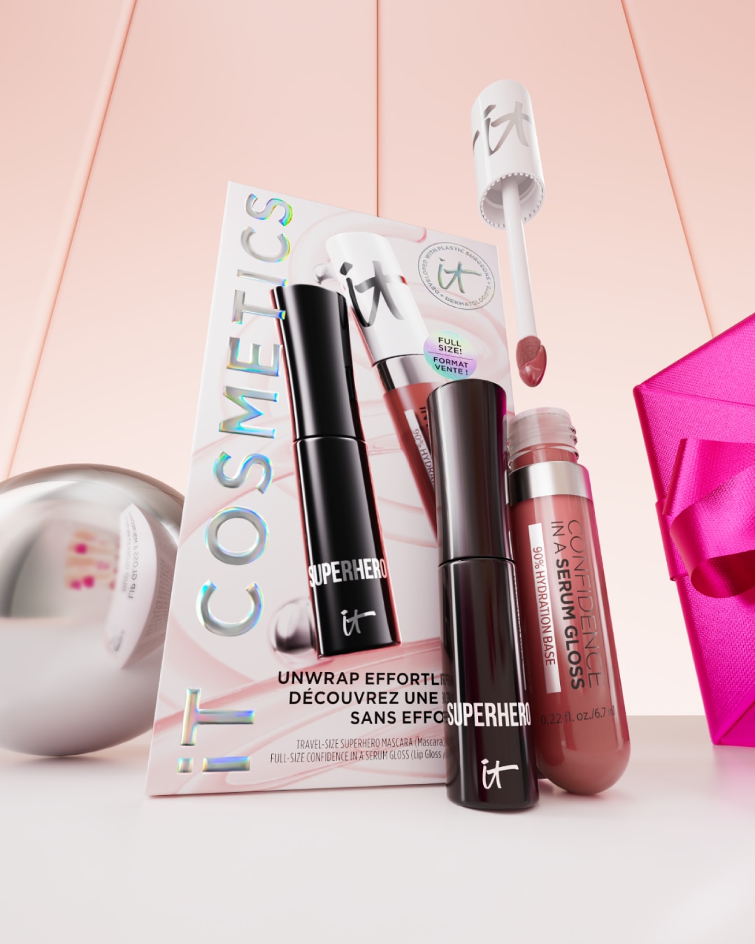 Entdecke das IT Cosmetics Set mit der Superhero Mascara in Reisegröße und dem Confidence in a Serum Gloss in Originalgröße für einen strahlenden Look!