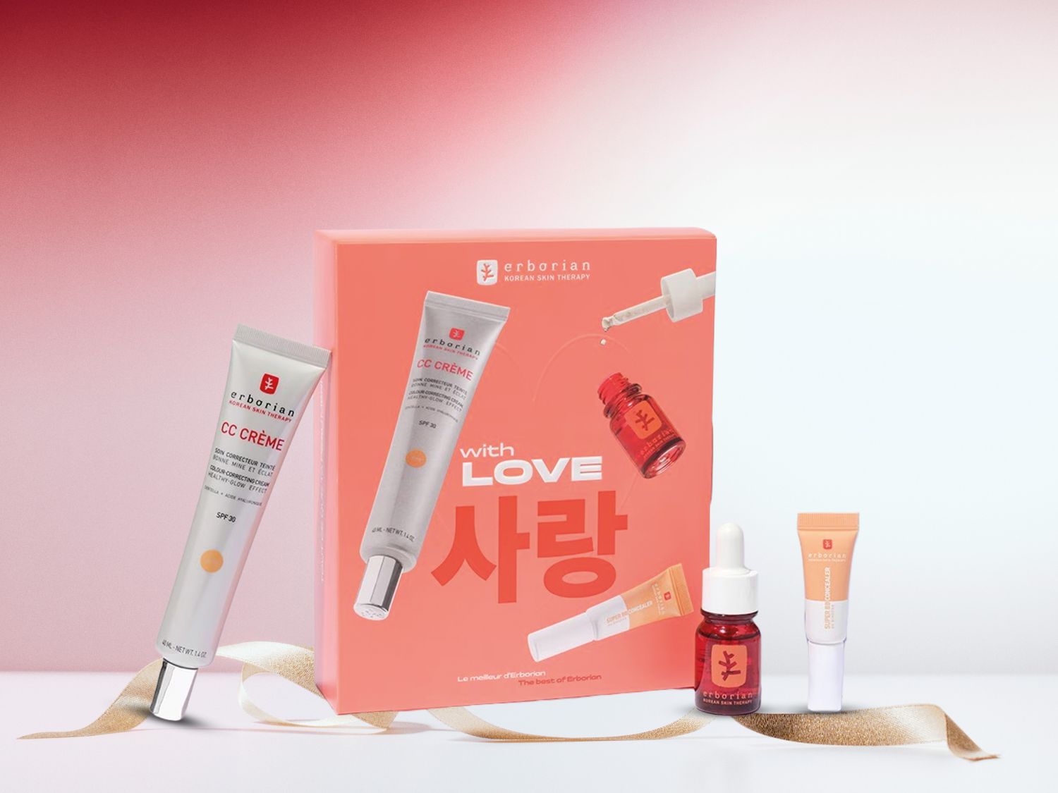 Een set Erborian Koreaanse huidverzorgingsproducten, waaronder CC Crème en Super BB Concealer, gepresenteerd in een roze verpakking met de tekst 'with LOVE'.