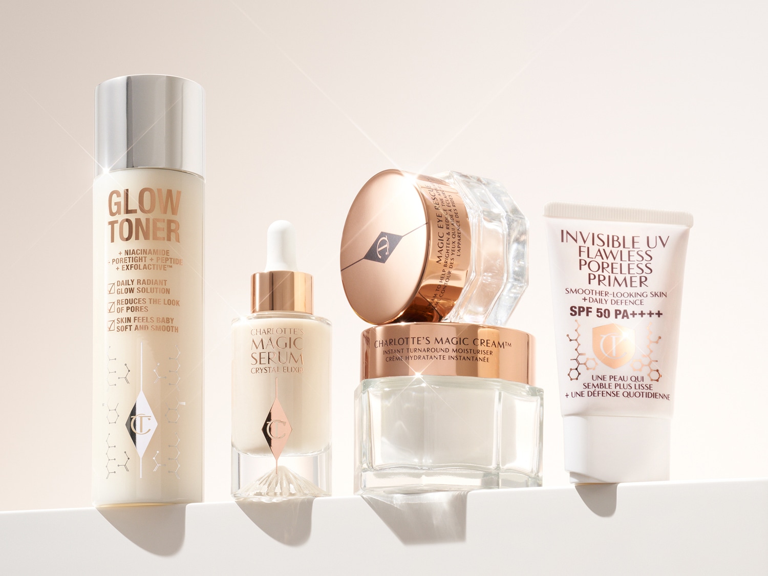 Entdecke Charlotte Tilburys Hautpflegekollektion, die Glow Toner, Magic Serum, Magic Cream und Invisible UV Flawless Poreless Primer umfasst, um deine Hautpflegeroutine zu verbessern.
