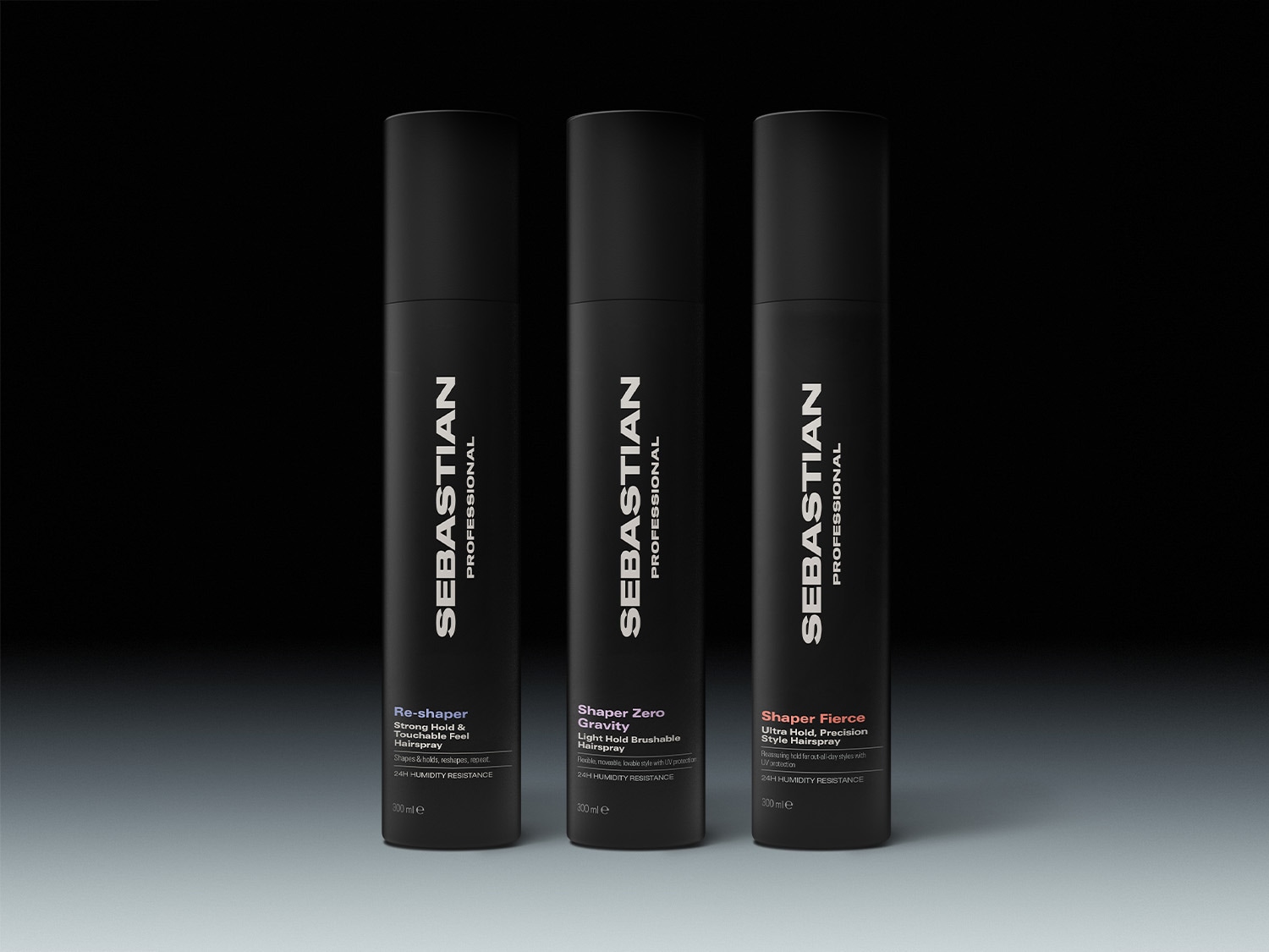 Drei schwarze Sprühflaschen von Sebastian Professional, darunter Re-shaper, Shaper Zero Gravity und Shaper Fierce, bieten starken, leichten und ultra Halt für präzise Frisuren mit UV-Schutz und Feuchtigkeitsresistenz.