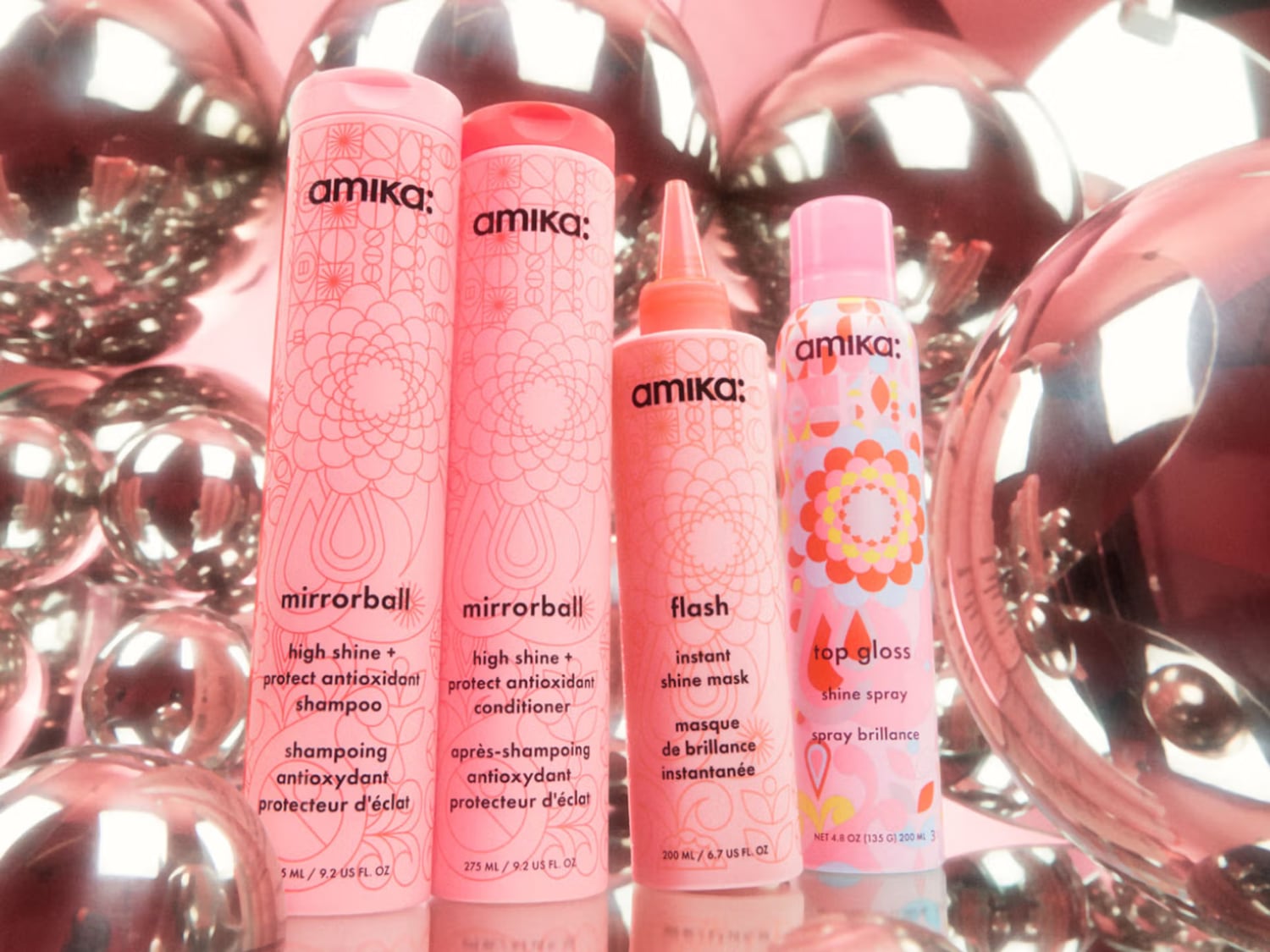 Découvrez le shampooing antioxydant Amika Mirrorball, pour une brillance éclatante et une protection optimale de vos cheveux.