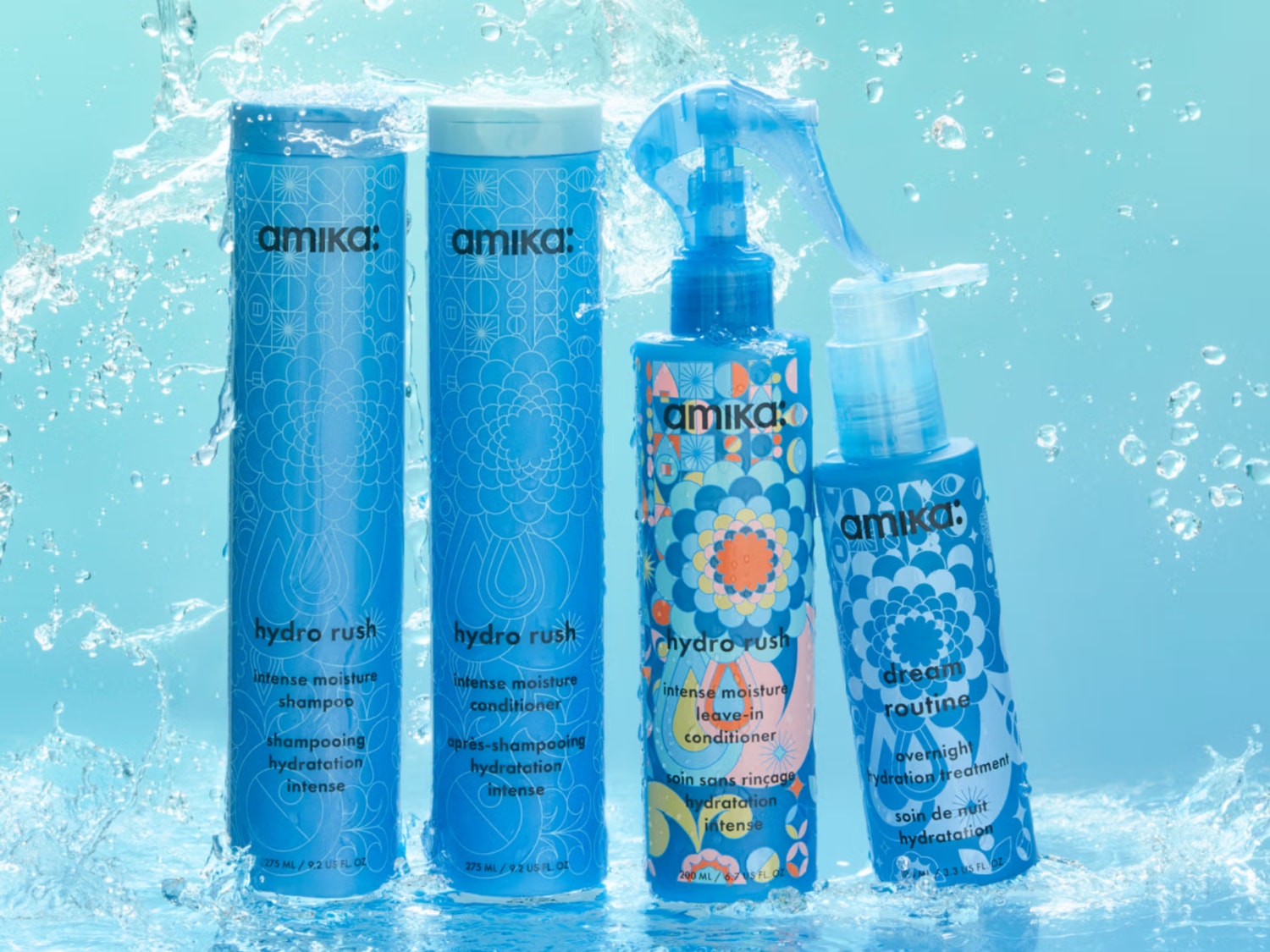 Découvrez la gamme Amika Hydro Rush pour une hydratation intense : shampooing, revitalisant, revitalisant sans rinçage et soin de nuit, le tout dans un emballage bleu vibrant.