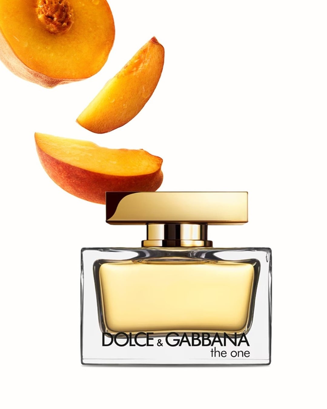 Ein Flakon von Dolce & Gabbana The One Eau de Parfum mit goldenem Verschluss und dem Duft von Pfirsich.
