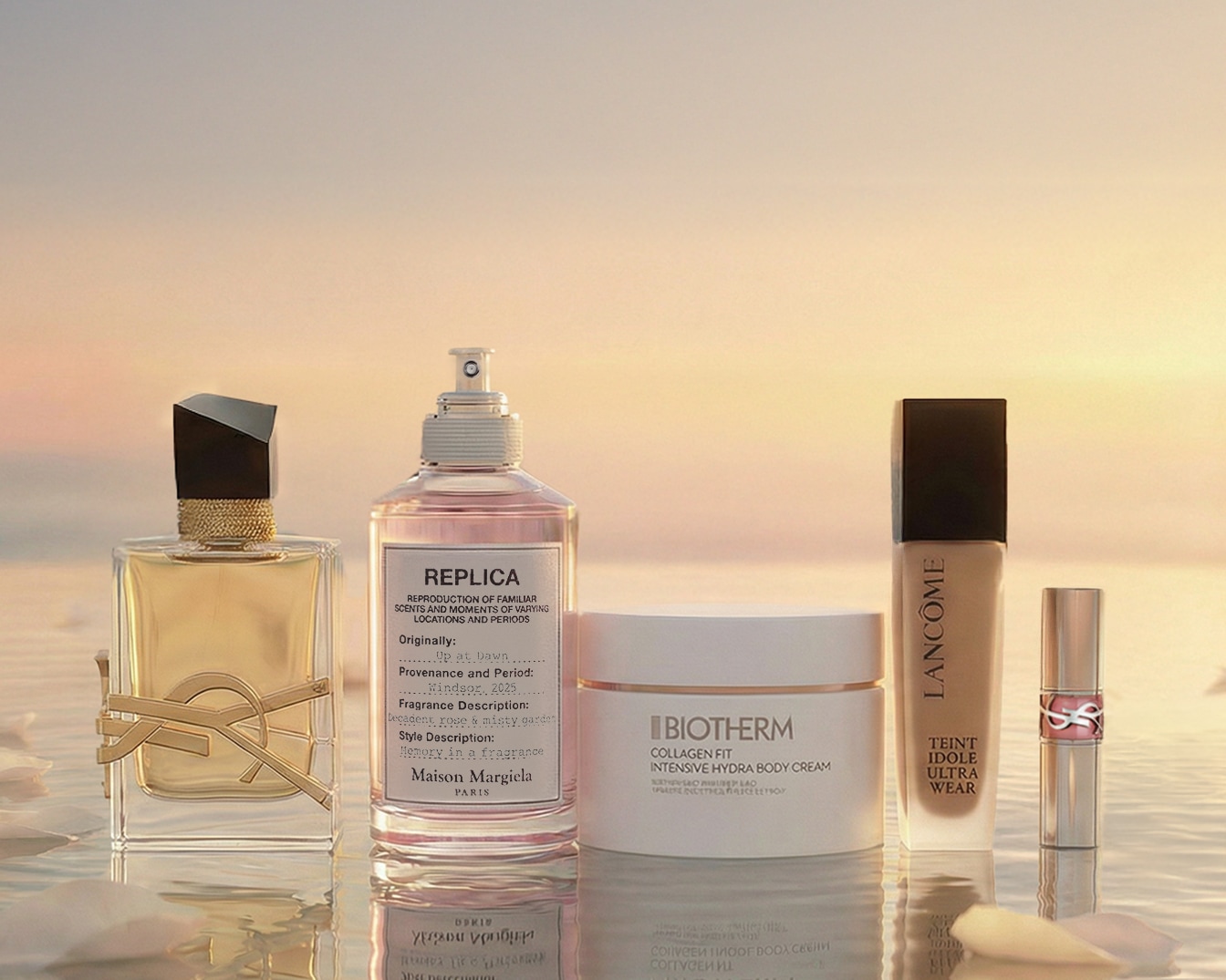 Entdecken Sie eine Auswahl an Schönheitsprodukten, darunter YSL Libre Eau de Parfum, Replica Up at Dawn, Biotherm Collagen Fit Body Cream, Lancôme Teint Idole Ultra Wear und YSL Rouge Volupté Shine.