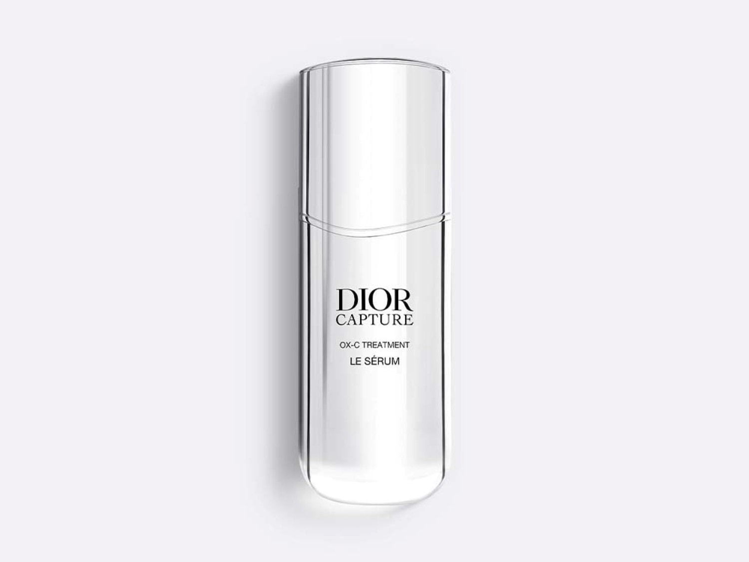 Découvrez le sérum OX-C Treatment Capture de Dior, un soin luxueux dans un flacon transparent élégant, conçu pour revitaliser et illuminer votre peau.