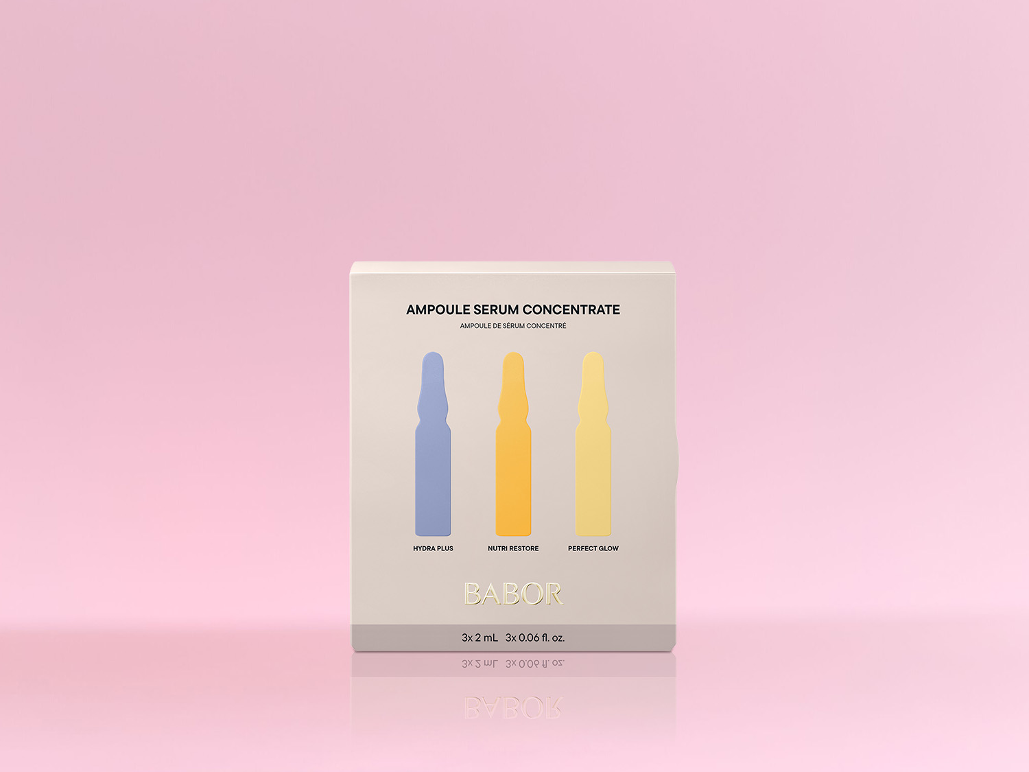 Die Ampullen Serum Konzentrat Packung von BABOR in Weiß zeigt drei Ampullen in Blau, Orange und Gelb für Hydra Plus, Nutri Restore und Perfect Glow.