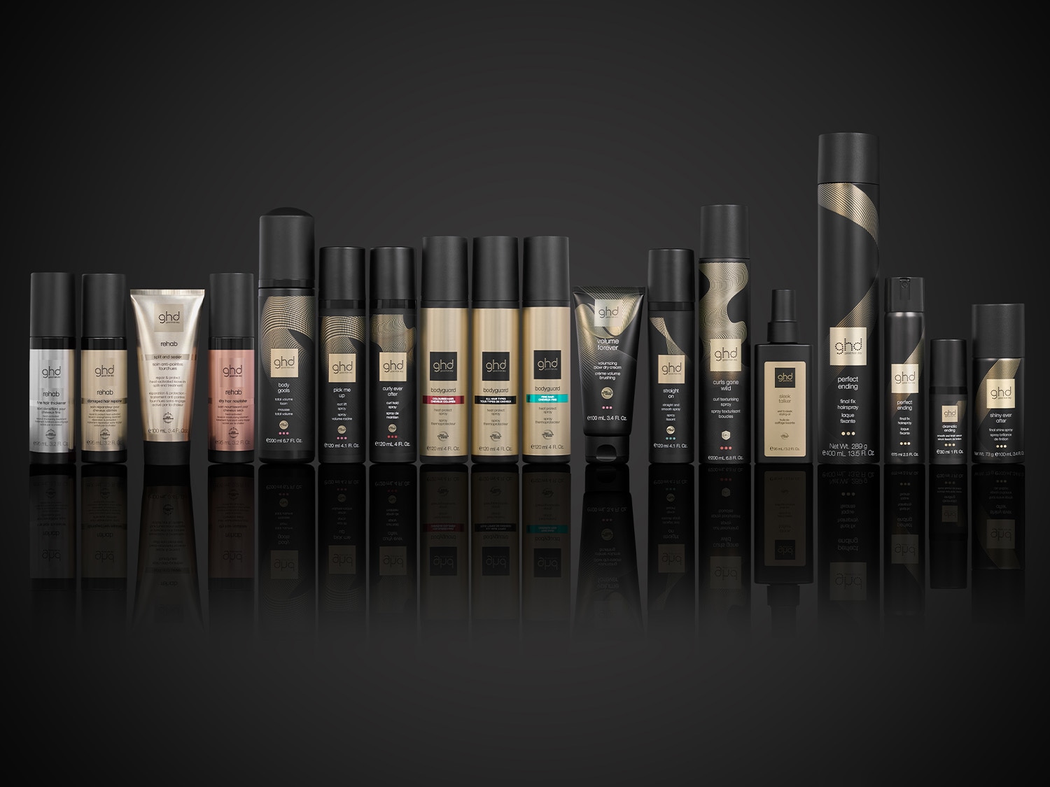 Eine umfassende Kollektion von GHD-Haarstylingprodukten, darunter Rehab, Volume Forever, Curl Gone Wild und Perfect Ending, präsentiert in eleganten schwarzen und goldenen Verpackungen.