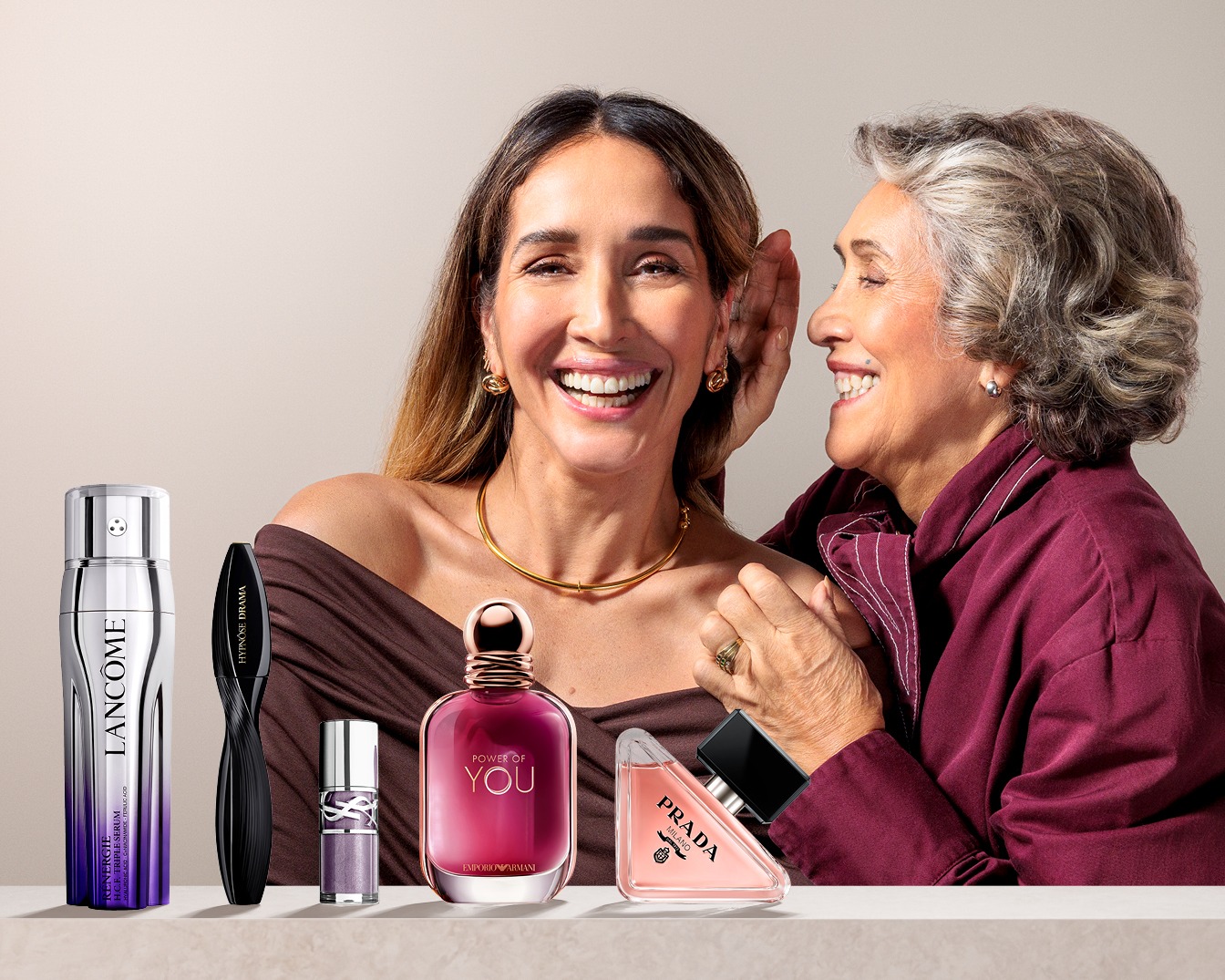 Découvrez une sélection de parfums et de produits de beauté, incluant Lancôme Rénergie H.C.F. Triple Serum, Hypnôse Drama de Lancôme, Power of You d'Emporio Armani et Prada Milano, présentés avec élégance.