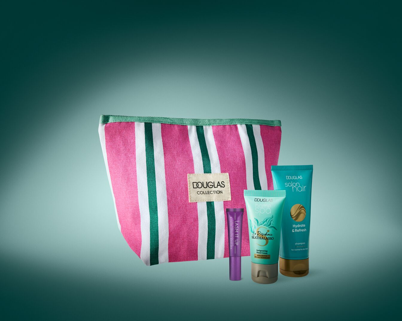 Douglas Collection includes a pink and white striped makeup bag, Lash It Up mascara, Home Spa Seathalasso, and Salon Hair Hydrate & Refresh shampoo.