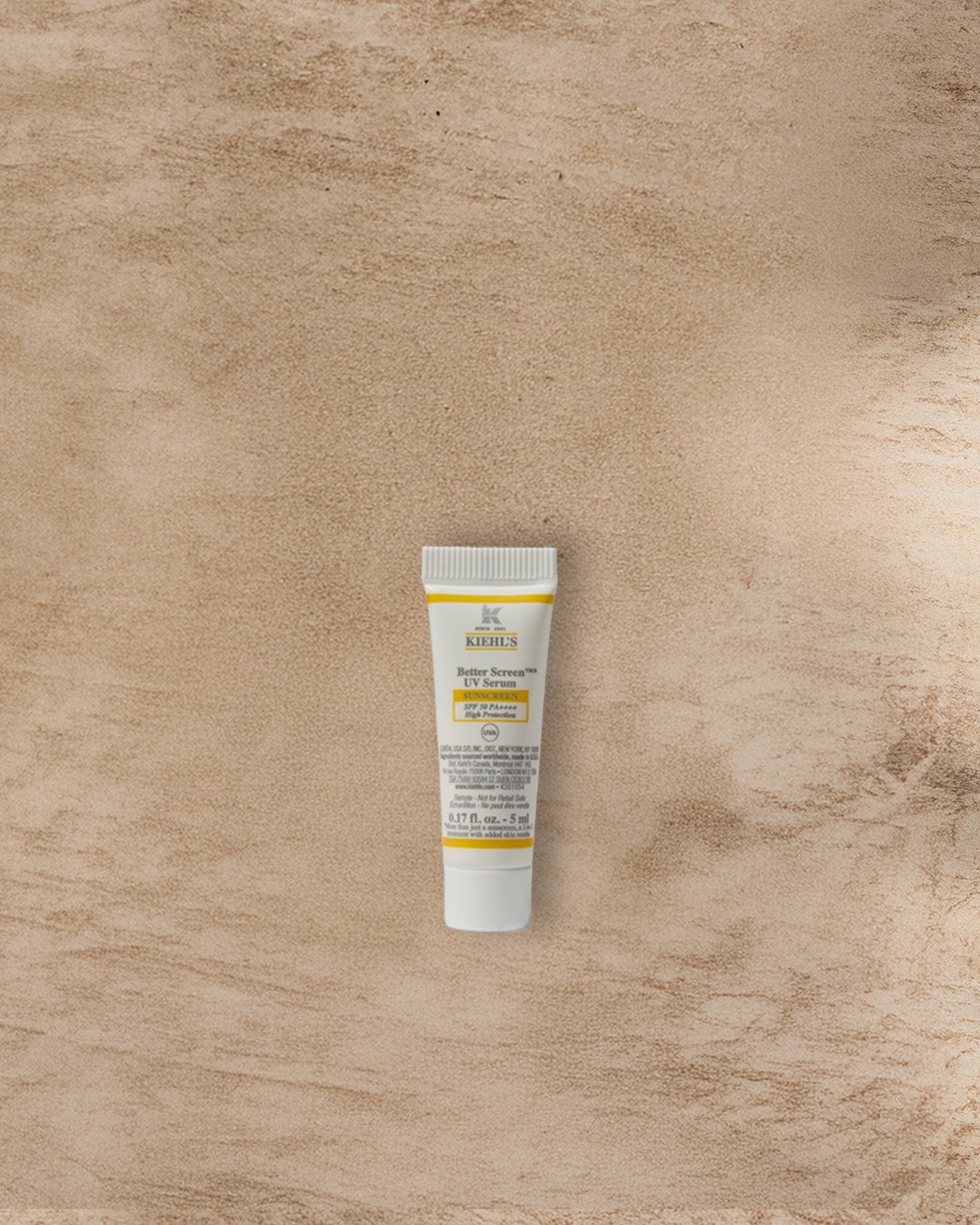 Kiehls Better Screen UV Serum mit Lichtschutzfaktor 50 in einer weißen Tube mit gelben Akzenten, die hohen Schutz vor Sonneneinstrahlung bietet.